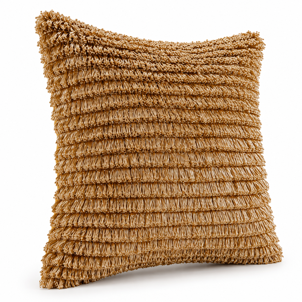 Angled view showing the cushion’s rows of gold fringe
