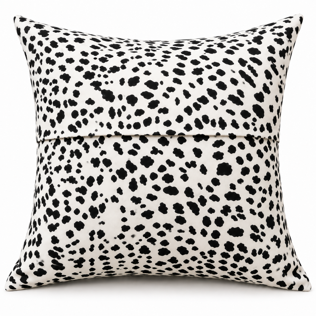 Back view of black and white spotted cushion