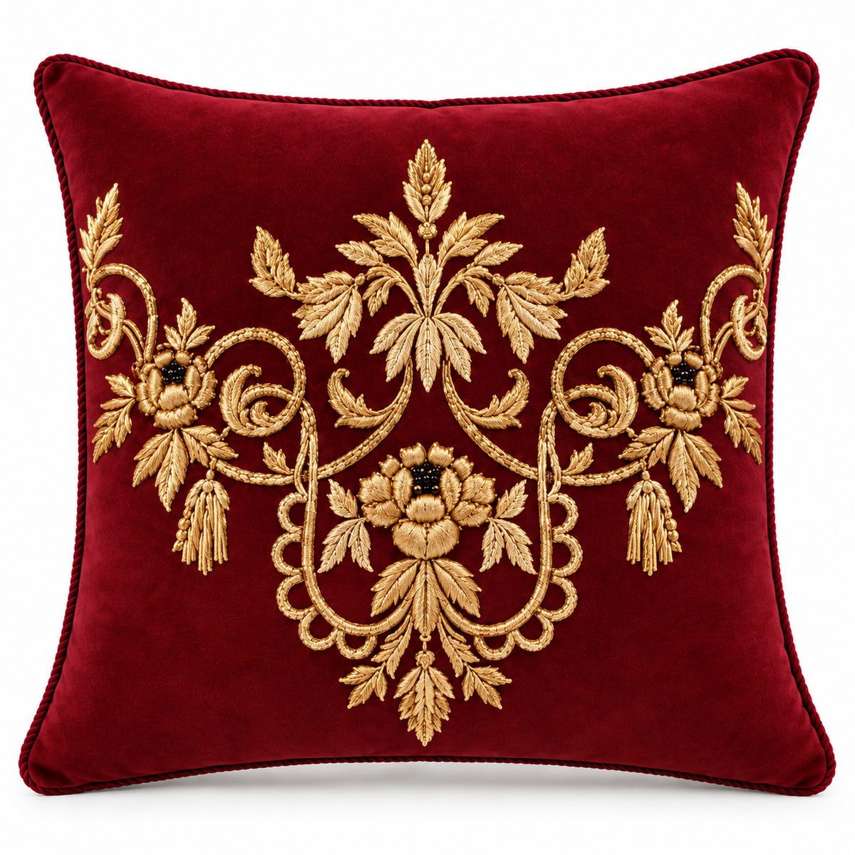 Front view of deep maroon cushion with ornate gold floral motif