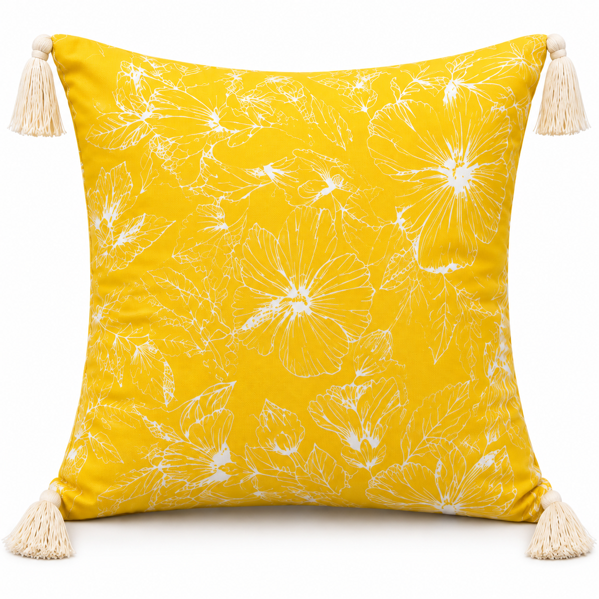 Front view of yellow cushion with white floral design and ivory corner tassels