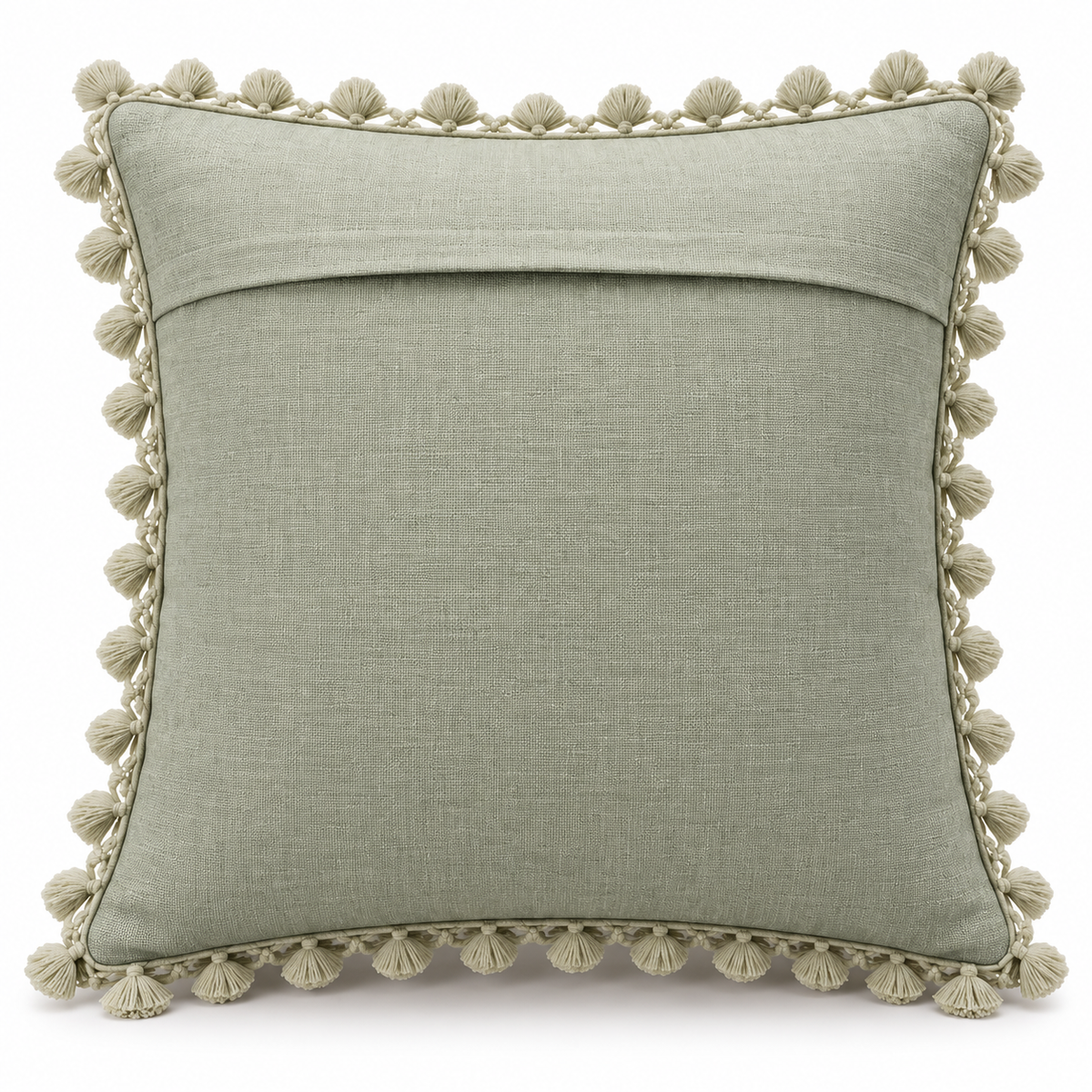 Plain sage green back of cushion cover with envelope-style opening and tassel trim.