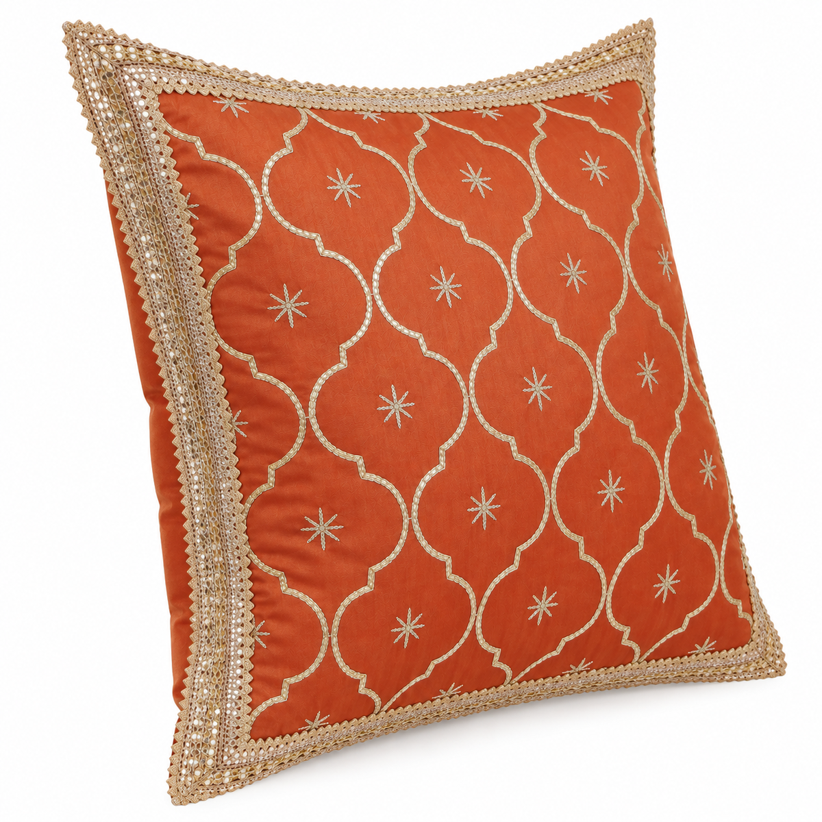 Angled view of rust orange and gold decorative cushion