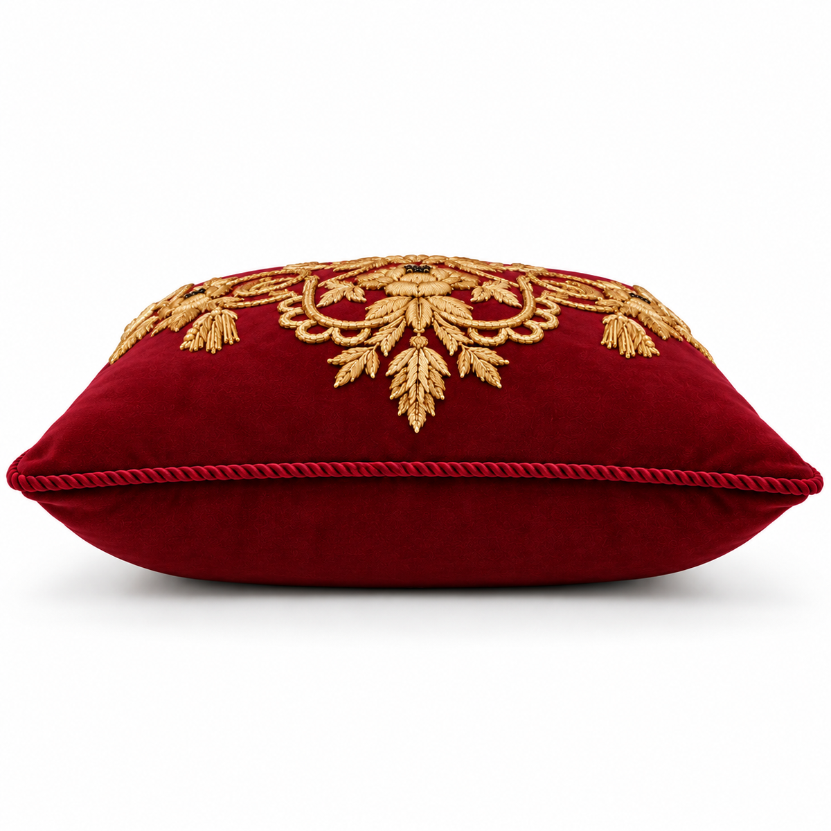 Side view of maroon cushion with piped edge
