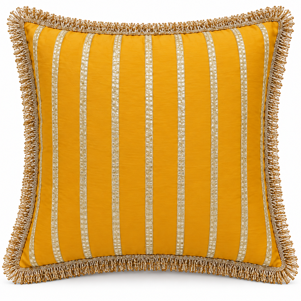 Front view of mustard yellow cushion with vertical gold stripes and fringe